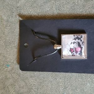 Pokémon zigzagzoon necklace